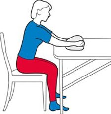 Woman in the middle of performing table slide