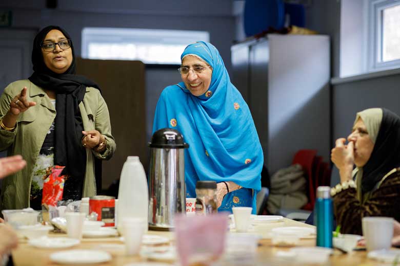 Women drinking teas and coffees
