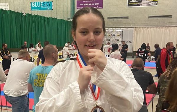 Holly wearing karate uniform 