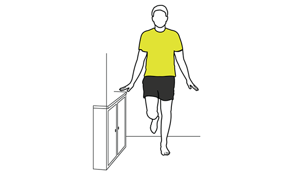 Standing on one leg balance ankle stretch