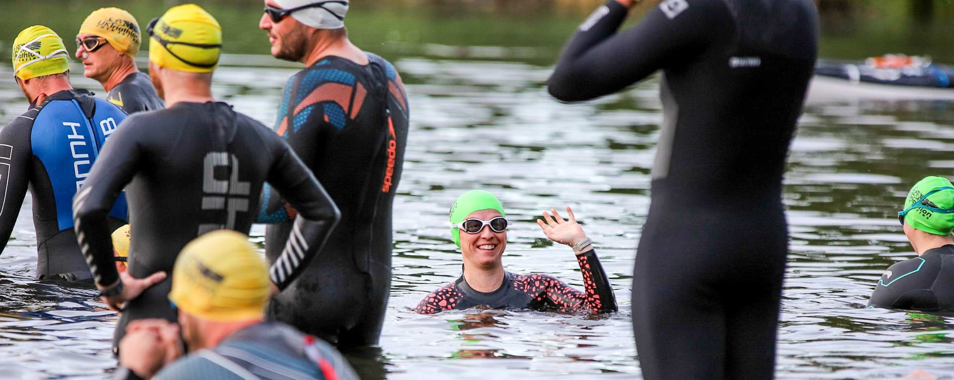 Triathlon challengers preparing to swim