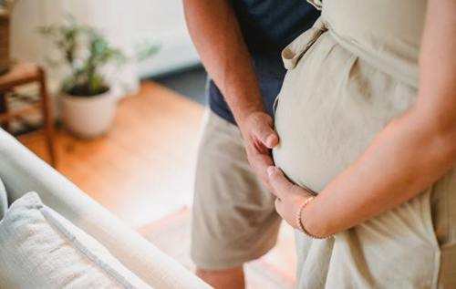 Partners holding bump