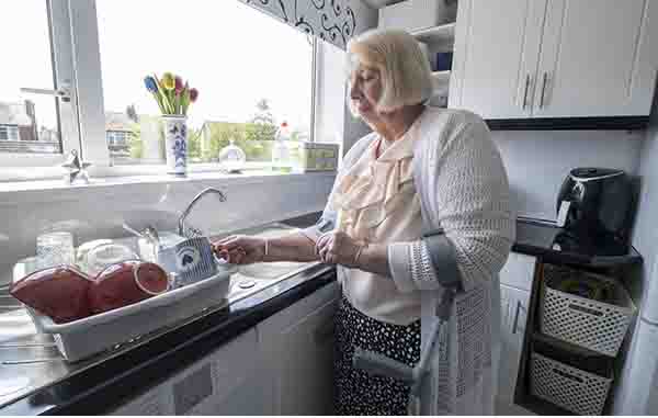 Mary washing dishes