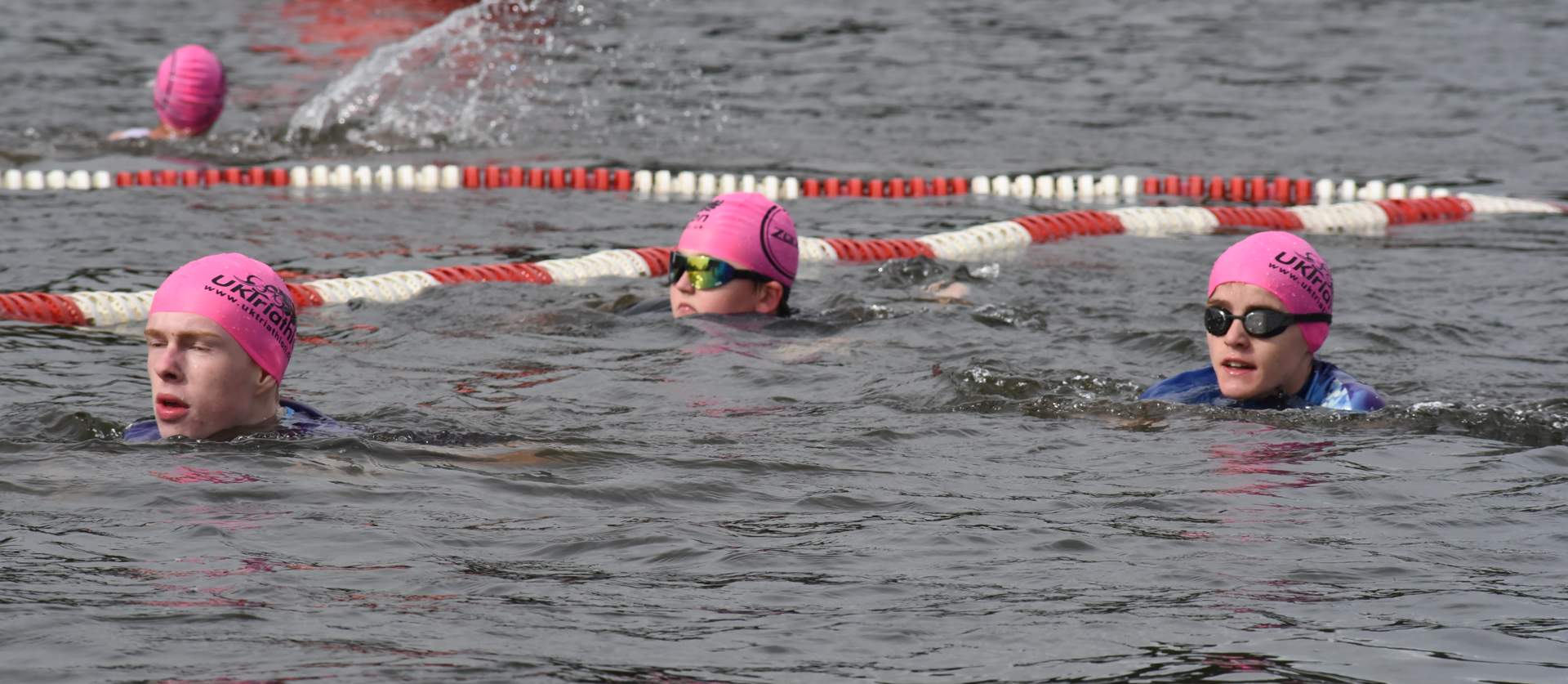 Triathlon challengers swimming