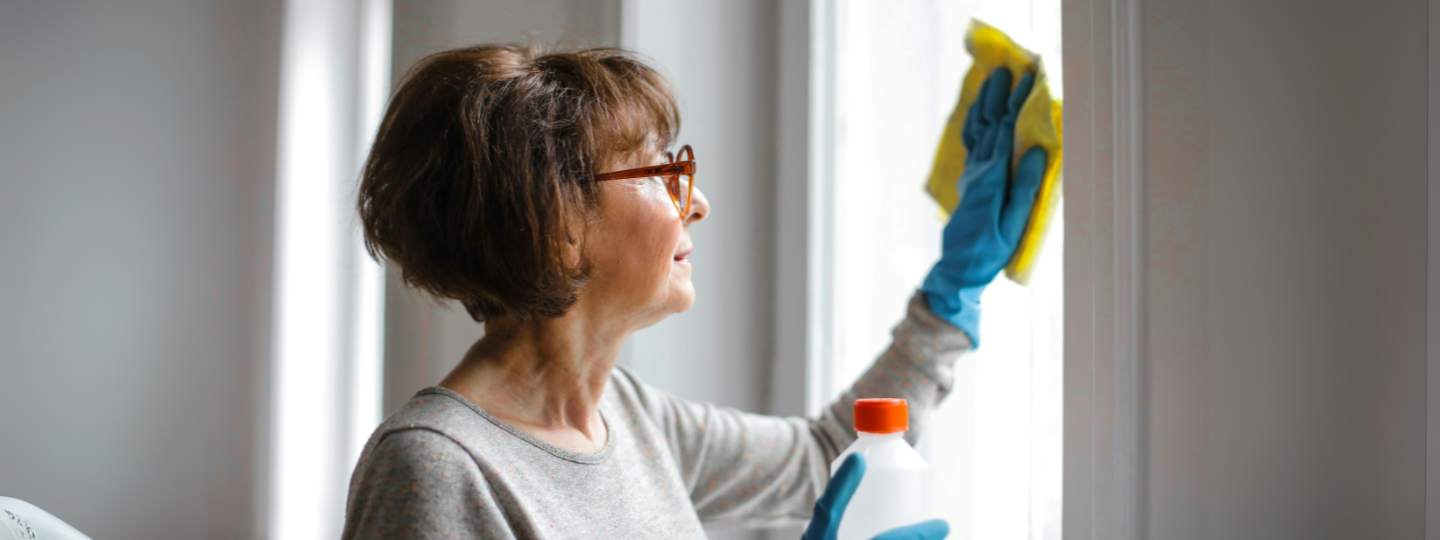 Woman cleaning home