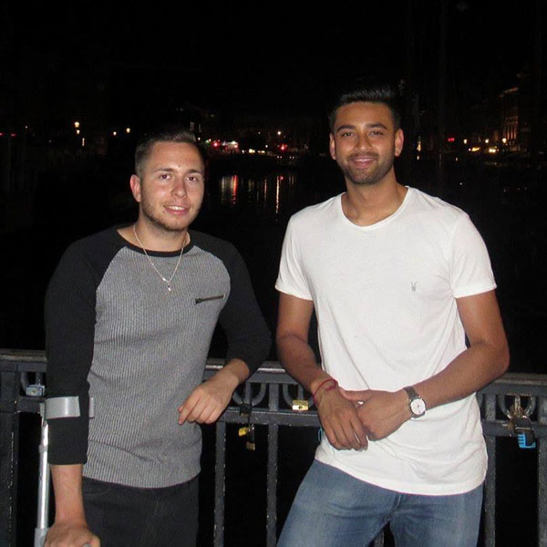 James And Anish Standing On A Bridge