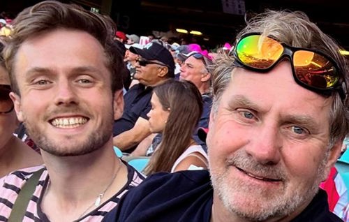 Henry and his Dad at a sporting event