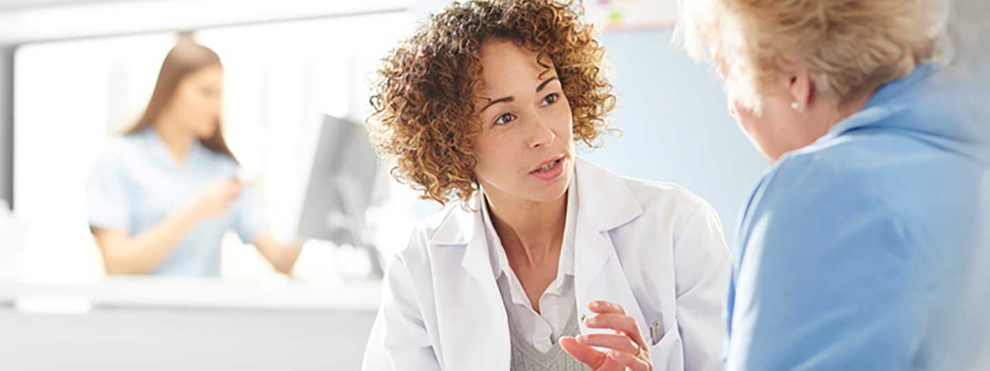 Doctor and arthritis patient
